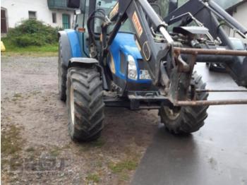 Farm tractor New Holland tl 100 hilo: picture 1