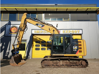 Caterpillar 312E - Crawler excavator: picture 1