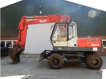O & K MH PLUS - Wheel excavator