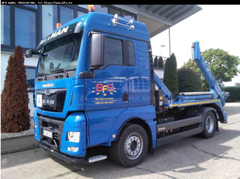 Skip loader truck MAN TGX 18.500