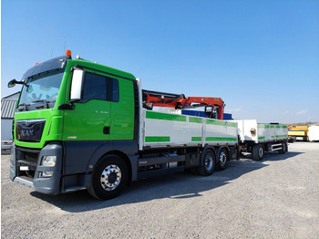 MAN TGX 26.520 - Dropside/ Flatbed truck: picture 1