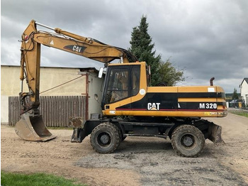 Wheel excavator CATERPILLAR M320