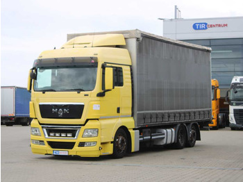 Curtainsider truck MAN TGX 24.440