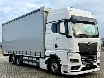 Curtainsider truck MAN TGX
