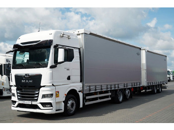 Curtainsider truck MAN TGX