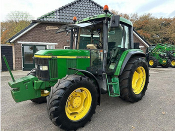 Farm tractor JOHN DEERE 6110