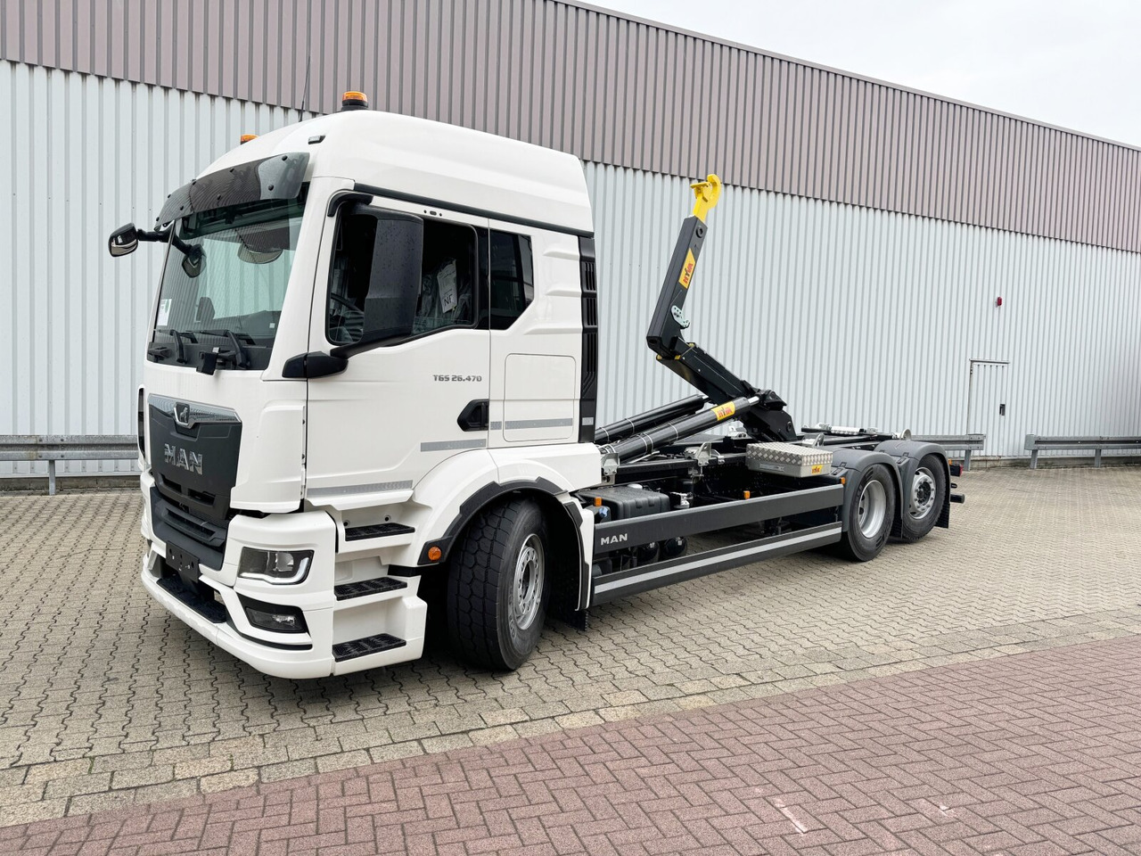 MAN TGS 26.470 6x2-4 LL CH TGS 26.470 6x2-4 LL CH, Retarder, Navi, Lenk-/Liftachse - Hook lift truck: picture 1 MAN TGS 26.470 6x2-4 LL CH TGS 26.470 6x2-4 LL CH, Retarder, Navi, Lenk-/Liftachse - Hook lift truck: picture 1