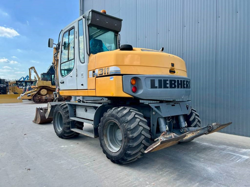 Liebherr A311 Litronic - Wheel excavator: picture 2 Liebherr A311 Litronic - Wheel excavator: picture 2