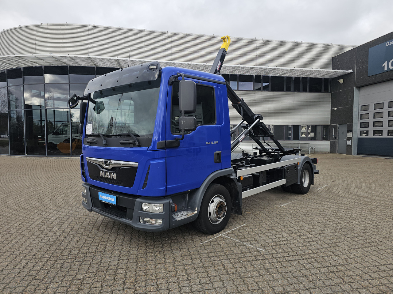 MAN TGL 12.190 BL - Hook lift truck: picture 1 MAN TGL 12.190 BL - Hook lift truck: picture 1