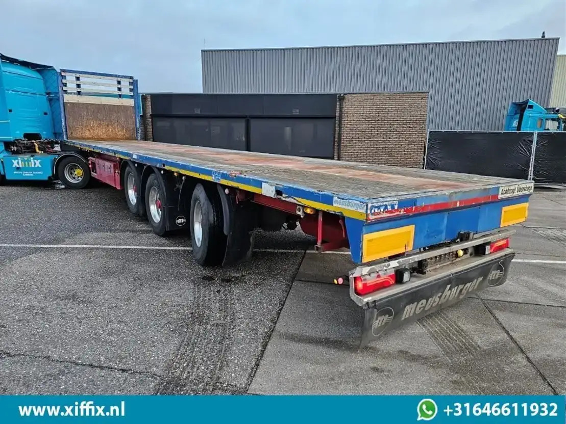 Meusburger 3-ass. Vlakke uitschuifbare oplegger / Naloop gestuurd / 14139 - Dropside/ Flatbed semi-trailer: picture 3 Meusburger 3-ass. Vlakke uitschuifbare oplegger / Naloop gestuurd / 14139 - Dropside/ Flatbed semi-trailer: picture 3