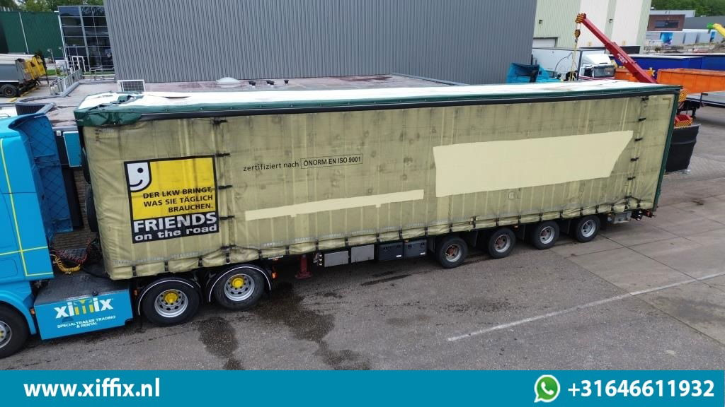 Meusburger 4-ass. Vlakke Mega oplegger met elektrische huifopbouw / 2x naloop ge - Dropside/ Flatbed semi-trailer: picture 1 Meusburger 4-ass. Vlakke Mega oplegger met elektrische huifopbouw / 2x naloop ge - Dropside/ Flatbed semi-trailer: picture 1