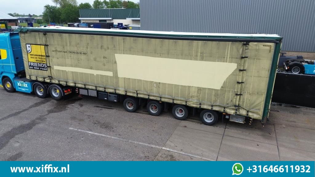 Meusburger 4-ass. Vlakke Mega oplegger met elektrische huifopbouw / 2x naloop ge - Dropside/ Flatbed semi-trailer: picture 2 Meusburger 4-ass. Vlakke Mega oplegger met elektrische huifopbouw / 2x naloop ge - Dropside/ Flatbed semi-trailer: picture 2