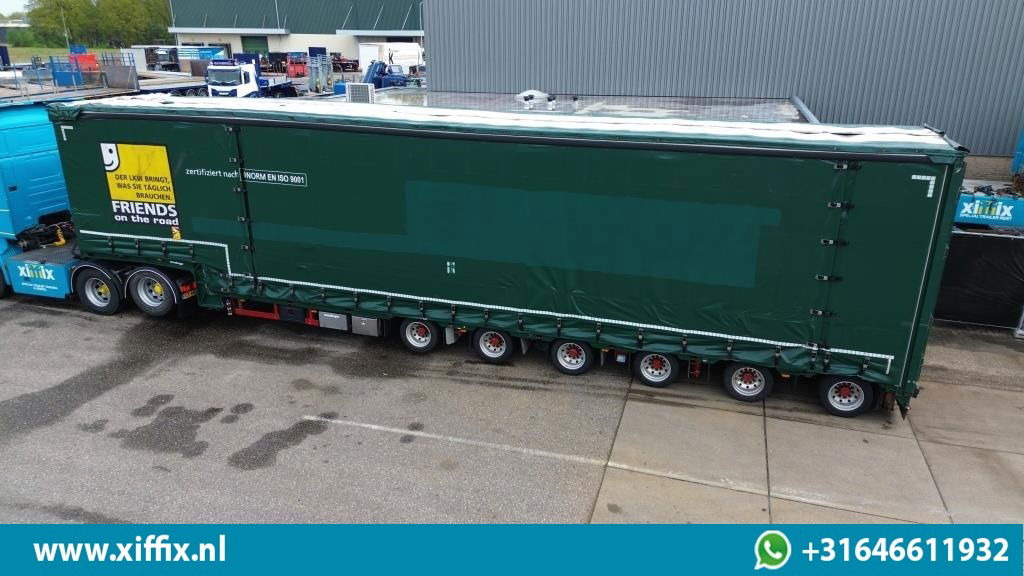 Meusburger 6-ass. Semi dieplader met elektrische huifopbouw / 3x naloop gestuurd - Low loader semi-trailer: picture 2 Meusburger 6-ass. Semi dieplader met elektrische huifopbouw / 3x naloop gestuurd - Low loader semi-trailer: picture 2