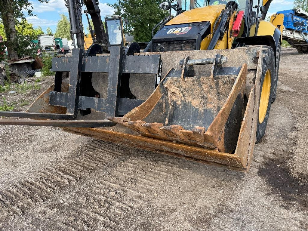 Backhoe loader CAT 444: picture 8