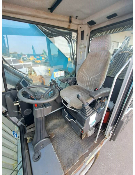Waste/ Industry handler for transportation of garbage Fuchs MHL340D: picture 6