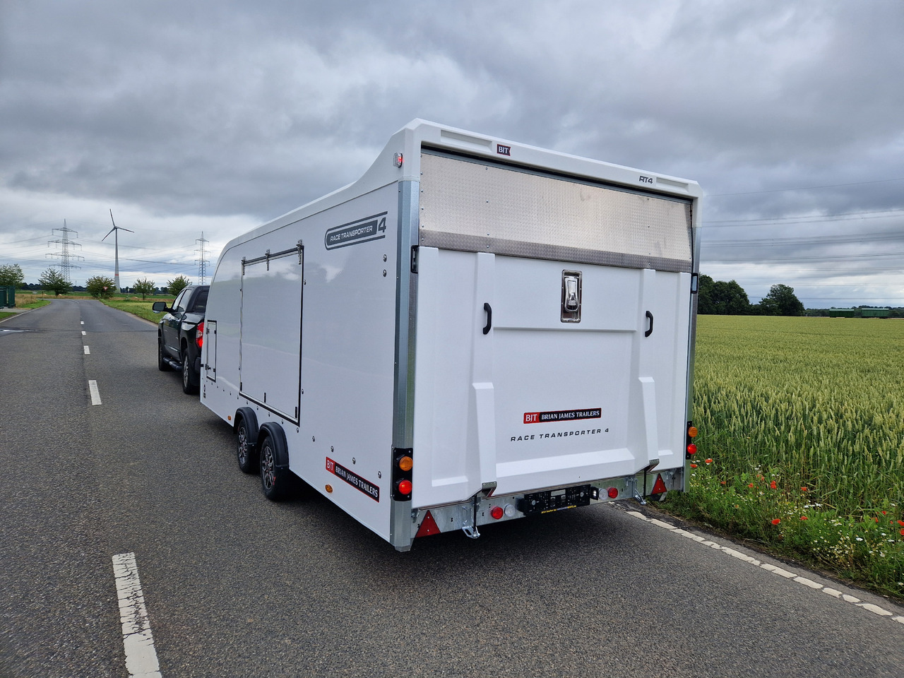 Autotransporter trailer BJT Race Transporter 4 550x212x188cm weiss E Winde Frontstauraum ASR Alufelgen dark 3500kg Modell 24: picture 13