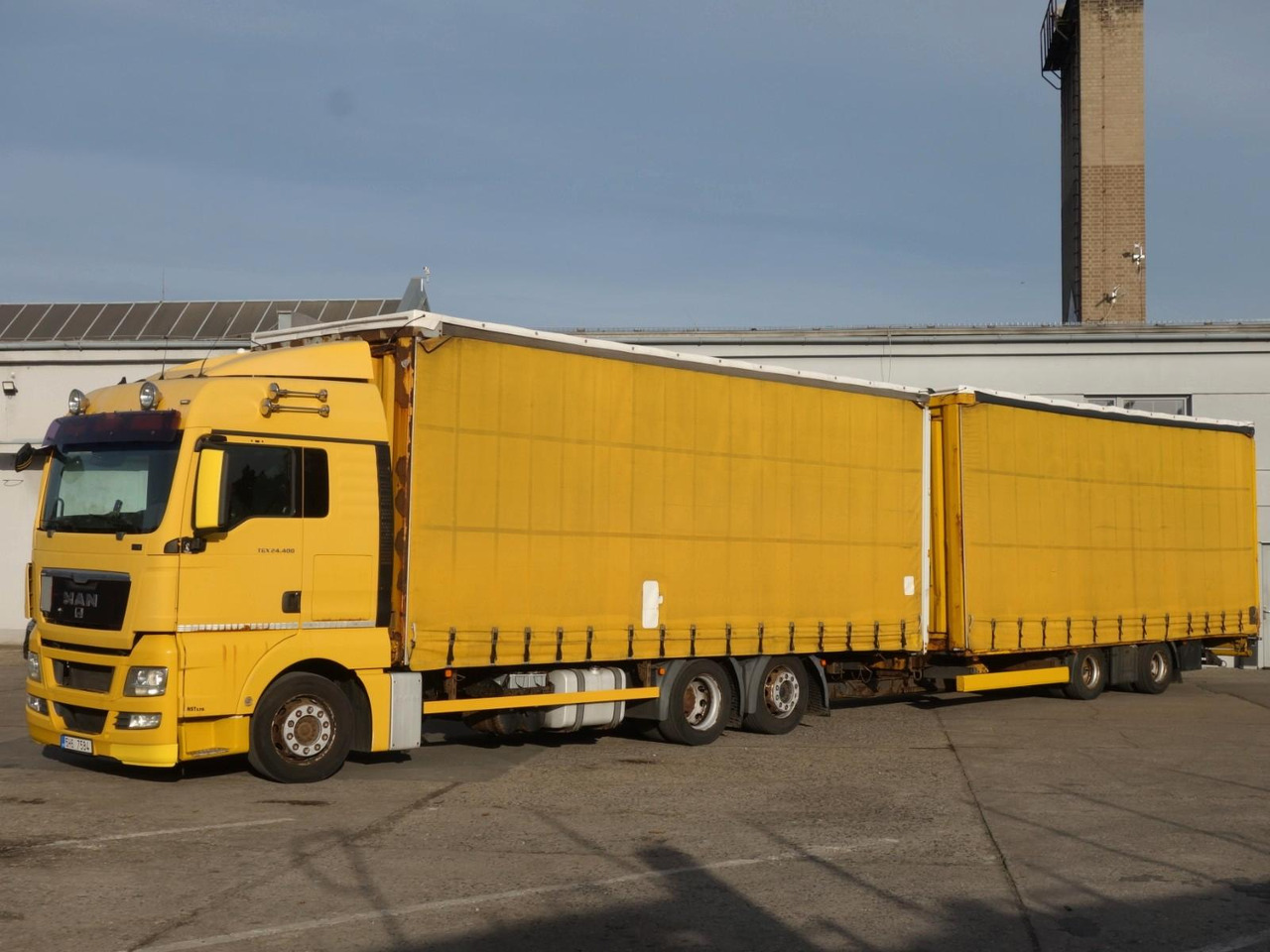 MAN TGX 24.400 EEV 6x2 + Anhänger Krone 120m3 - Curtainsider truck: picture 1 MAN TGX 24.400 EEV 6x2 + Anhänger Krone 120m3 - Curtainsider truck: picture 1
