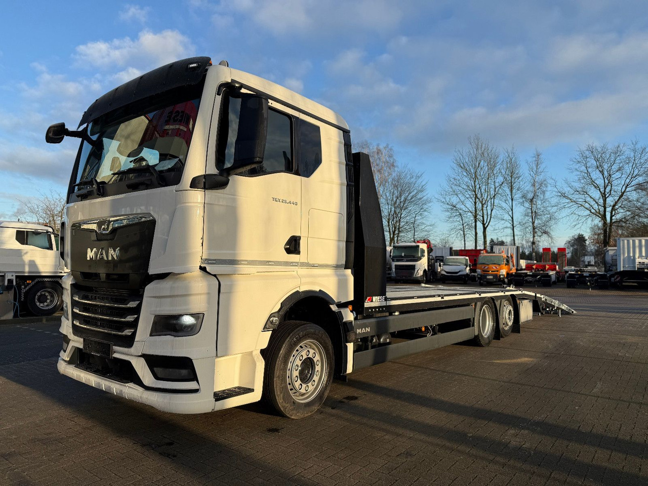 MAN Baumaschinen-  Arbeitsbühnentransporter Rampen - Dropside/ Flatbed truck: picture 5 MAN Baumaschinen-  Arbeitsbühnentransporter Rampen - Dropside/ Flatbed truck: picture 5