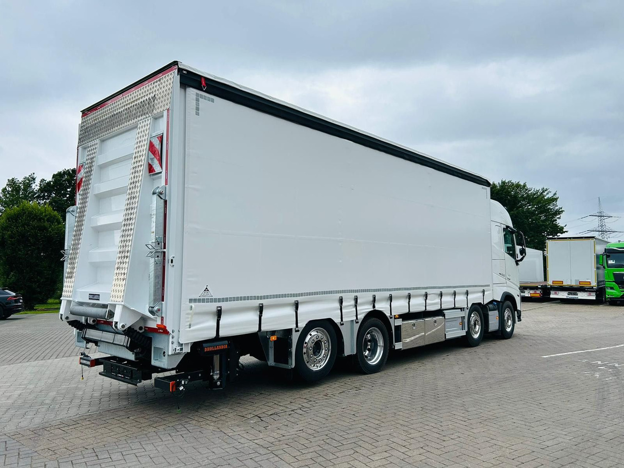 Curtainsider truck Volvo FH 500 Gabelstaplertransporter LBW 9t Dhollandia: picture 7