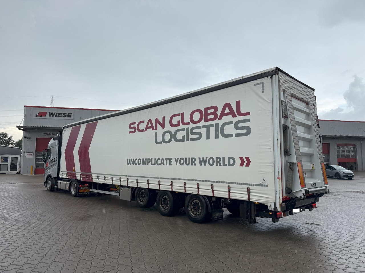 Wiese Mega Schiebeplane mit Dhollandia Rampe 9t - Low loader semi-trailer: picture 1 Wiese Mega Schiebeplane mit Dhollandia Rampe 9t - Low loader semi-trailer: picture 1