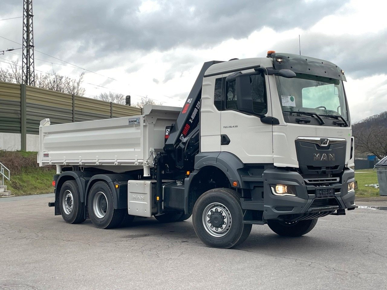 MAN TGS 28.440 6x4-4/3-Seiten- Kipper / Hiab 228-6 - Tipper, Crane truck: picture 1 MAN TGS 28.440 6x4-4/3-Seiten- Kipper / Hiab 228-6 - Tipper, Crane truck: picture 1