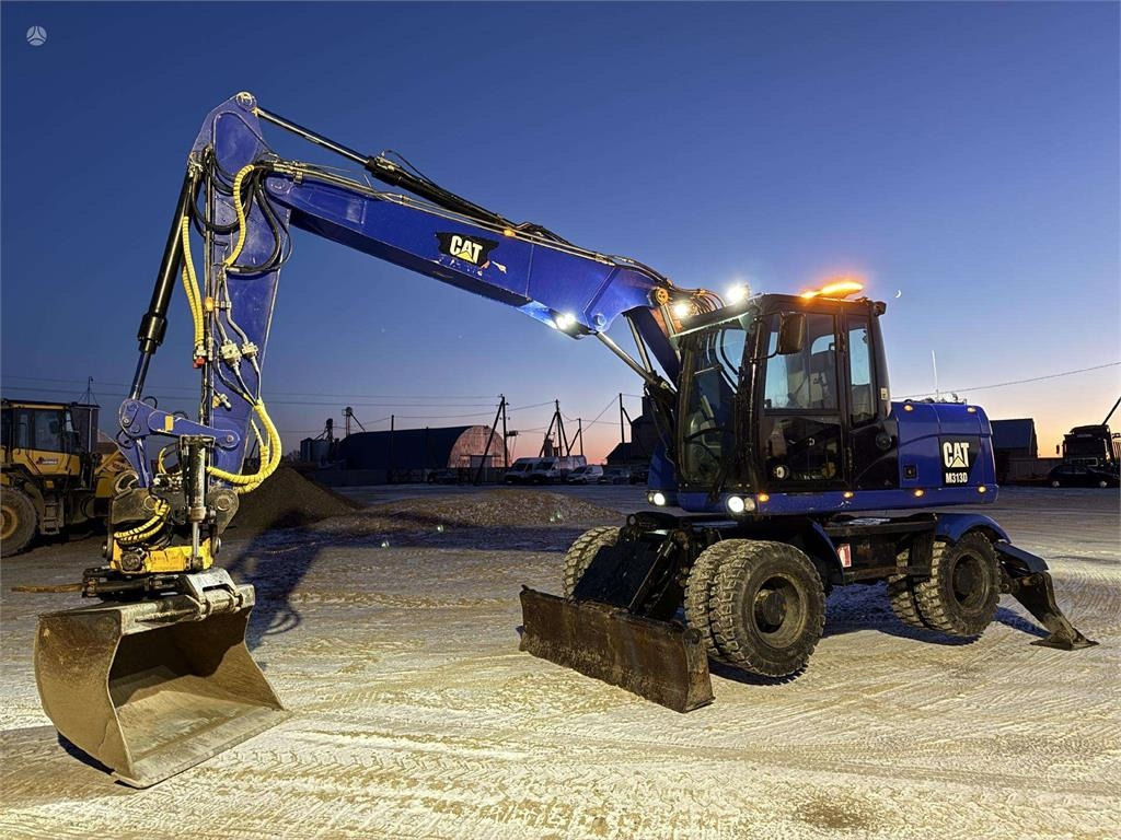 CAT M 313 D Rototilt + Grapple - Wheel excavator: picture 1 CAT M 313 D Rototilt + Grapple - Wheel excavator: picture 1