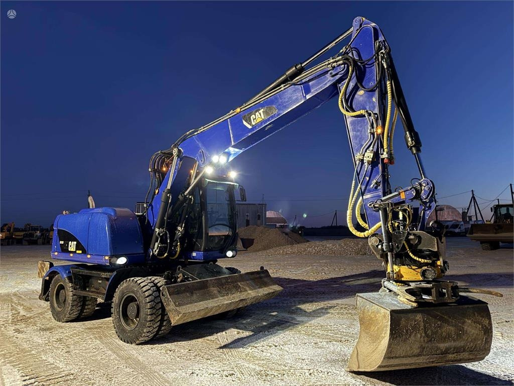 CAT M 313 D Rototilt + Grapple - Wheel excavator: picture 5 CAT M 313 D Rototilt + Grapple - Wheel excavator: picture 5