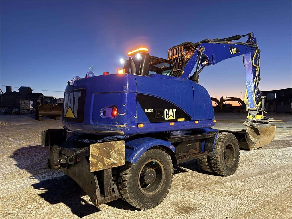 CAT M 313 D Rototilt + Grapple - Wheel excavator: picture 3 CAT M 313 D Rototilt + Grapple - Wheel excavator: picture 3
