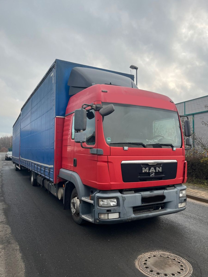 MAN 8.220 4X2 Pritschenwagen - Curtainsider truck: picture 2 MAN 8.220 4X2 Pritschenwagen - Curtainsider truck: picture 2