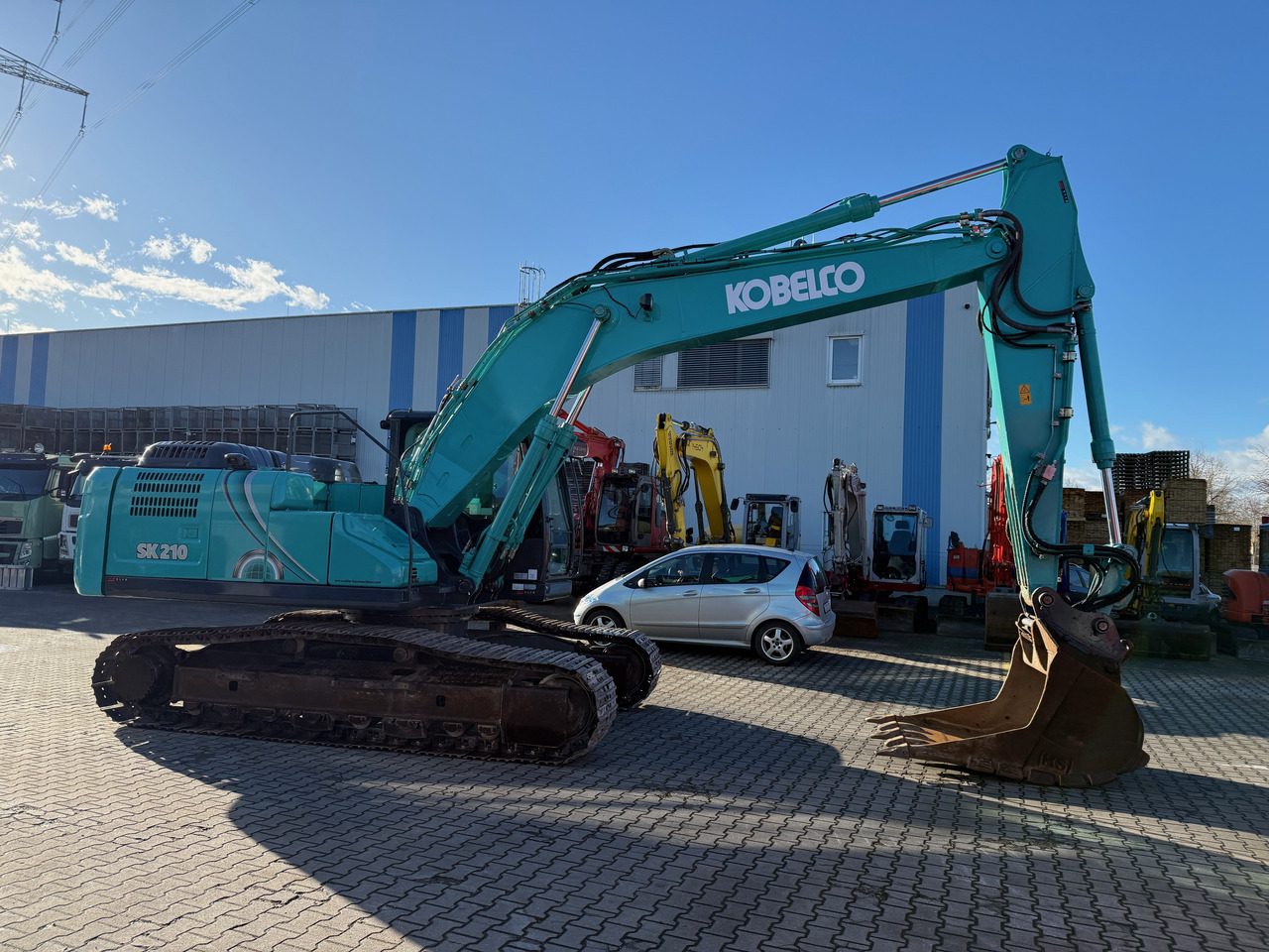 Kobelco SK210 NLC-10 Kettenbagger Oilquick Klima - Crawler excavator: picture 3 Kobelco SK210 NLC-10 Kettenbagger Oilquick Klima - Crawler excavator: picture 3