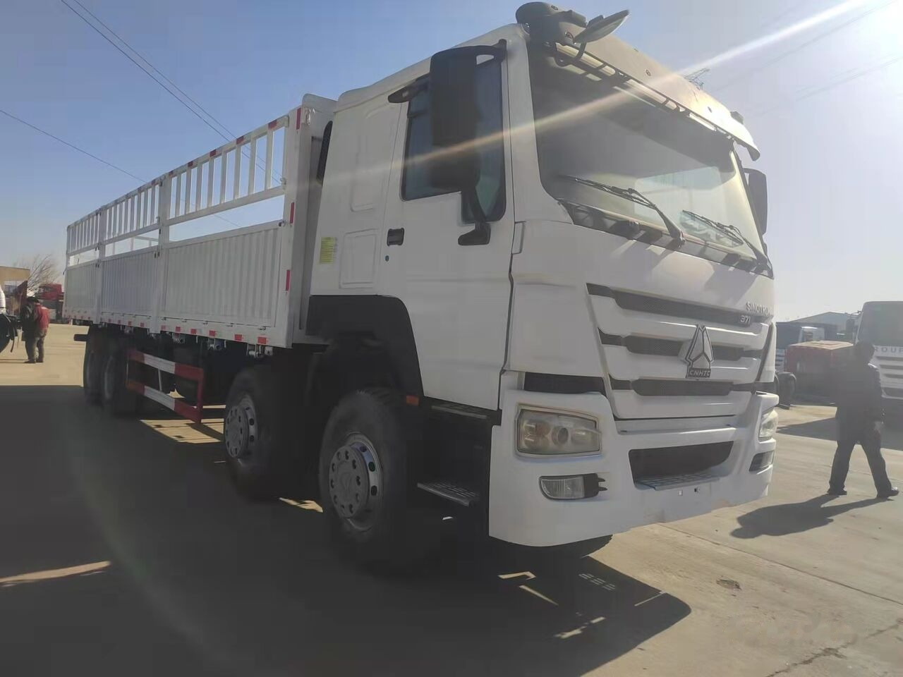 Sinotruk HOWO 8*4 Dump truck - Dropside/ Flatbed truck: picture 4 Sinotruk HOWO 8*4 Dump truck - Dropside/ Flatbed truck: picture 4