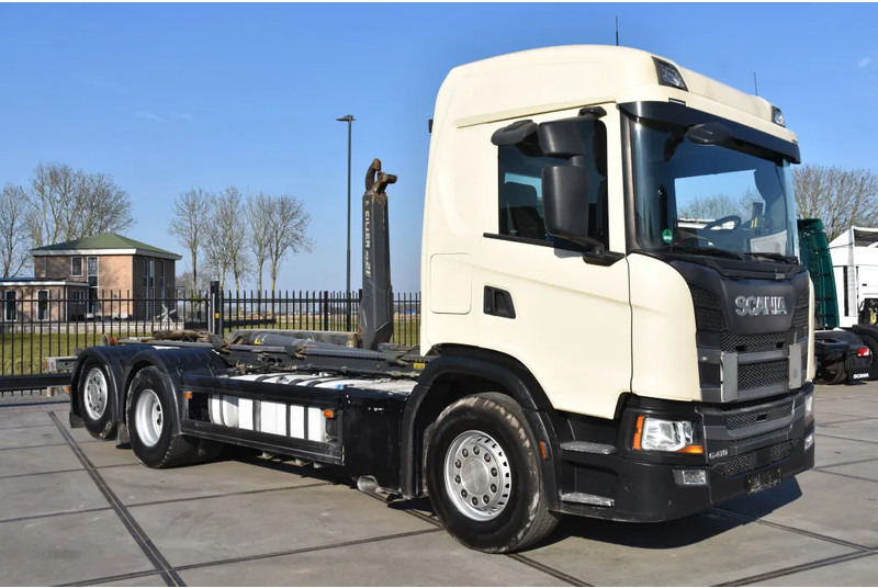 Scania G410 NGS 6x2*4 - HOOKLIFT - 306 TKM - AIRCO - NAVI - WHEELBASE: 455 CM - GOOD CONDITION - - Hook lift truck: picture 1 Scania G410 NGS 6x2*4 - HOOKLIFT - 306 TKM - AIRCO - NAVI - WHEELBASE: 455 CM - GOOD CONDITION - - Hook lift truck: picture 1