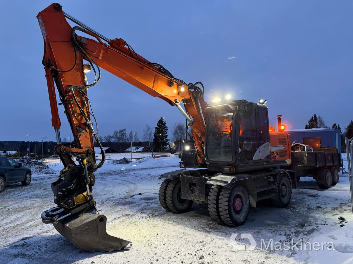 Hjulgrävare Hitachi ZX140W-5B med tillbehör - Crawler excavator: picture 1 Hjulgrävare Hitachi ZX140W-5B med tillbehör - Crawler excavator: picture 1