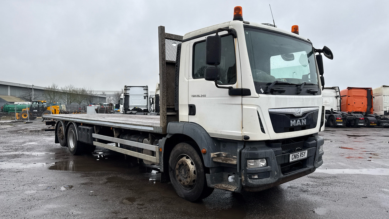 MAN TG-M 26.340 - Dropside/ Flatbed truck: picture 1 MAN TG-M 26.340 - Dropside/ Flatbed truck: picture 1