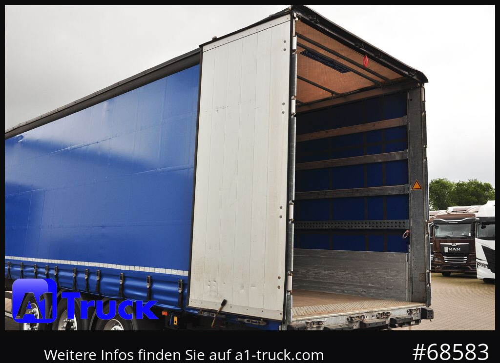 SCHMITZ SCS, Bordwandsider, Steckrungen, Liftachse, verzinkt - Curtainsider semi-trailer: picture 4 SCHMITZ SCS, Bordwandsider, Steckrungen, Liftachse, verzinkt - Curtainsider semi-trailer: picture 4