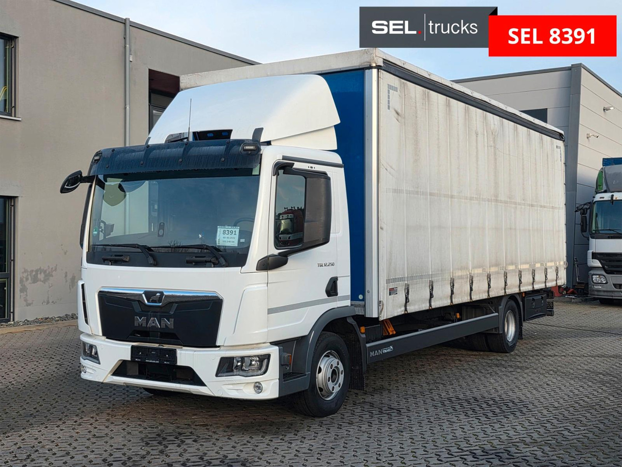 MAN TGX 12.250 4X2 BL CH / Totwinkelkamera / 6E - Curtainsider truck: picture 1 MAN TGX 12.250 4X2 BL CH / Totwinkelkamera / 6E - Curtainsider truck: picture 1