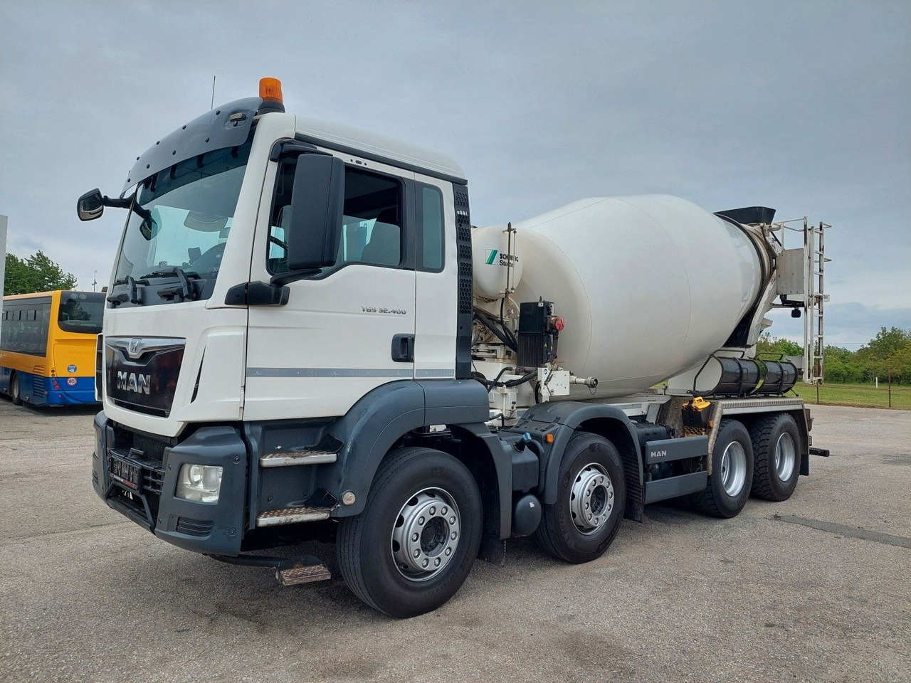 MAN TGS 32.400 8X4 BB Stetter 9 m³ - Concrete mixer truck: picture 1 MAN TGS 32.400 8X4 BB Stetter 9 m³ - Concrete mixer truck: picture 1