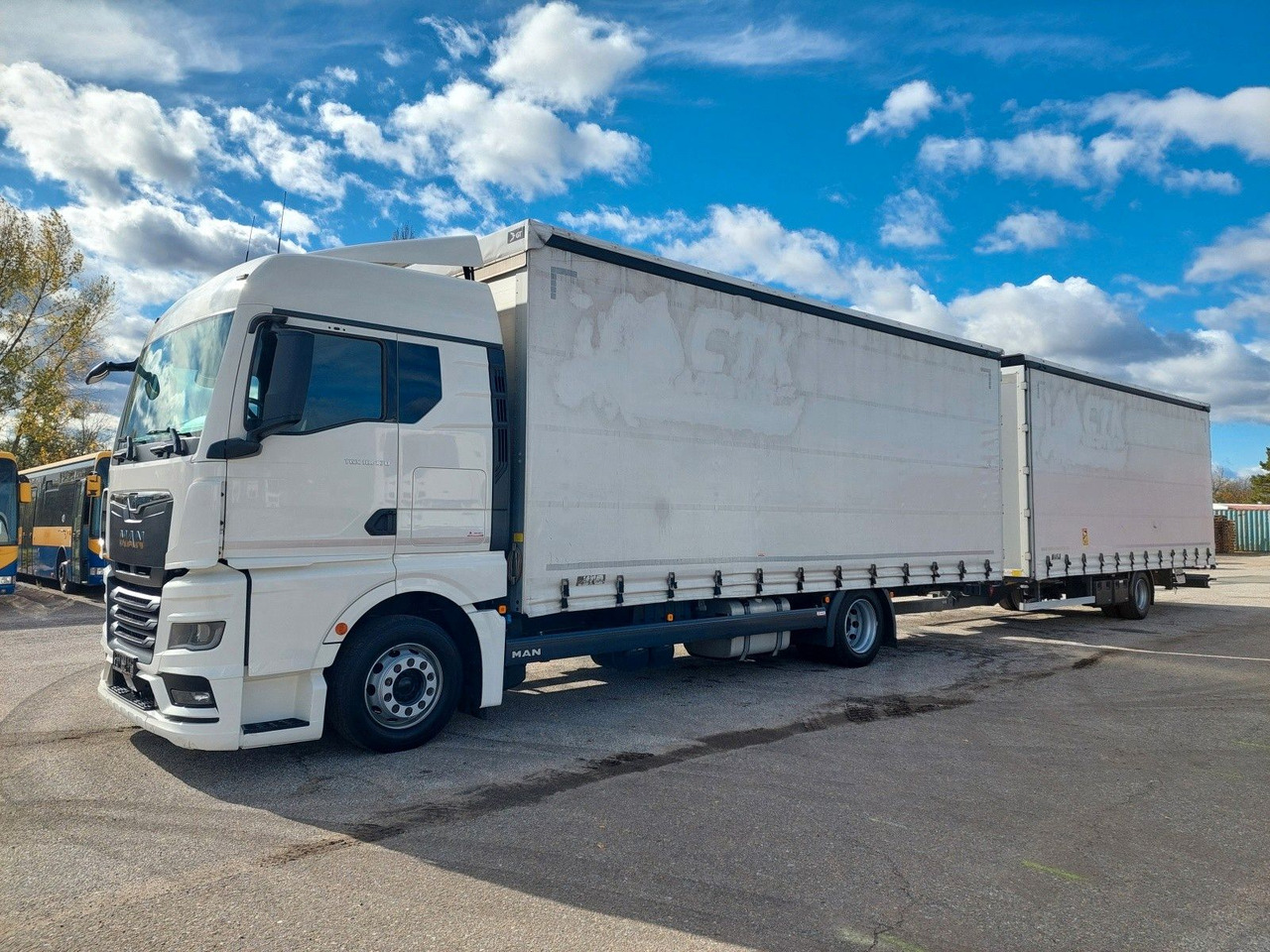 MAN TGX 18.470 LL + Gniotpol G-4080 120 m3 Durchbar - Curtainsider truck: picture 1 MAN TGX 18.470 LL + Gniotpol G-4080 120 m3 Durchbar - Curtainsider truck: picture 1