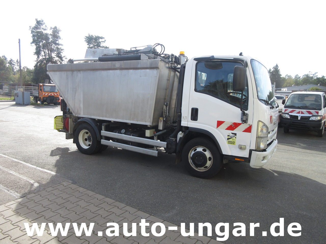Isuzu NPR 75 Müllwagen Provence Benne - Faun Lifter Presse Kipper Trittbrett Bj 12 - Garbage truck: picture 1 Isuzu NPR 75 Müllwagen Provence Benne - Faun Lifter Presse Kipper Trittbrett Bj 12 - Garbage truck: picture 1