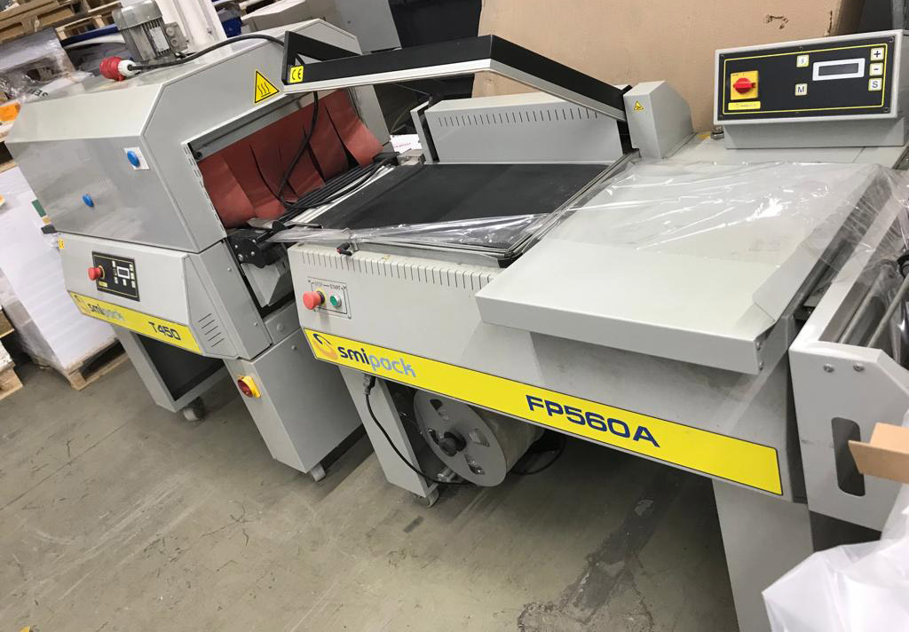 Smipack FP 560 A semi-automatic angle welder with Smipack T 450 single-chamber shrink tunnel - Packaging machinery: picture 1 Smipack FP 560 A semi-automatic angle welder with Smipack T 450 single-chamber shrink tunnel - Packaging machinery: picture 1