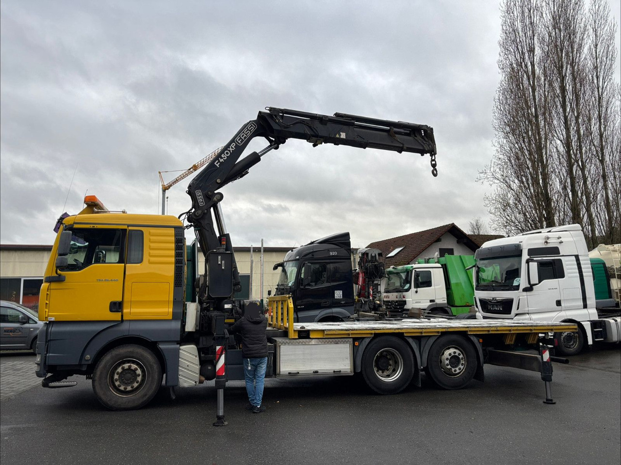 MAN TGA 26.440 FASSI F450AXP Containerauf./Lenkachse - Crane truck: picture 2 MAN TGA 26.440 FASSI F450AXP Containerauf./Lenkachse - Crane truck: picture 2
