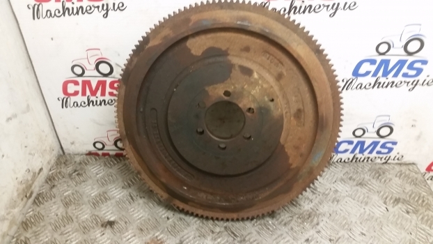 Ford New Holland 40, Ts, 7840 Engine Flywheel Assembly E9nn6375cb, 81866593 - Flywheel for Farm tractor: picture 1 Ford New Holland 40, Ts, 7840 Engine Flywheel Assembly E9nn6375cb, 81866593 - Flywheel for Farm tractor: picture 1