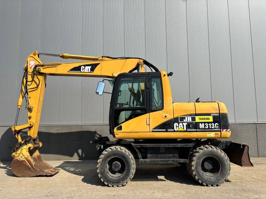 CAT M 313 C (Low verified hours) - Wheel excavator: picture 1 CAT M 313 C (Low verified hours) - Wheel excavator: picture 1