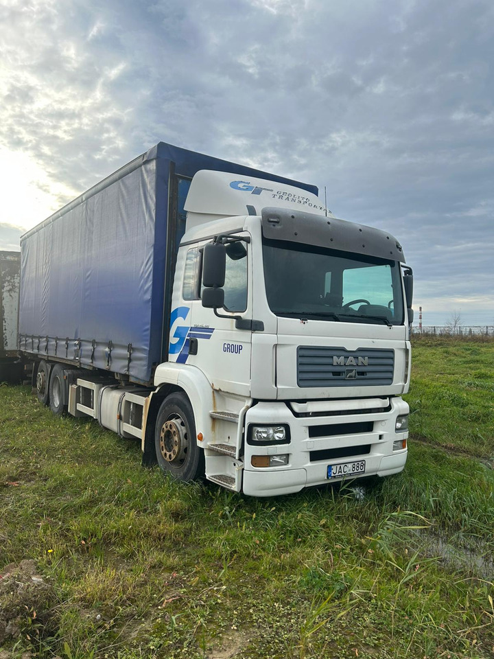 MAN TGA 26.310 - Curtainsider truck: picture 1 MAN TGA 26.310 - Curtainsider truck: picture 1