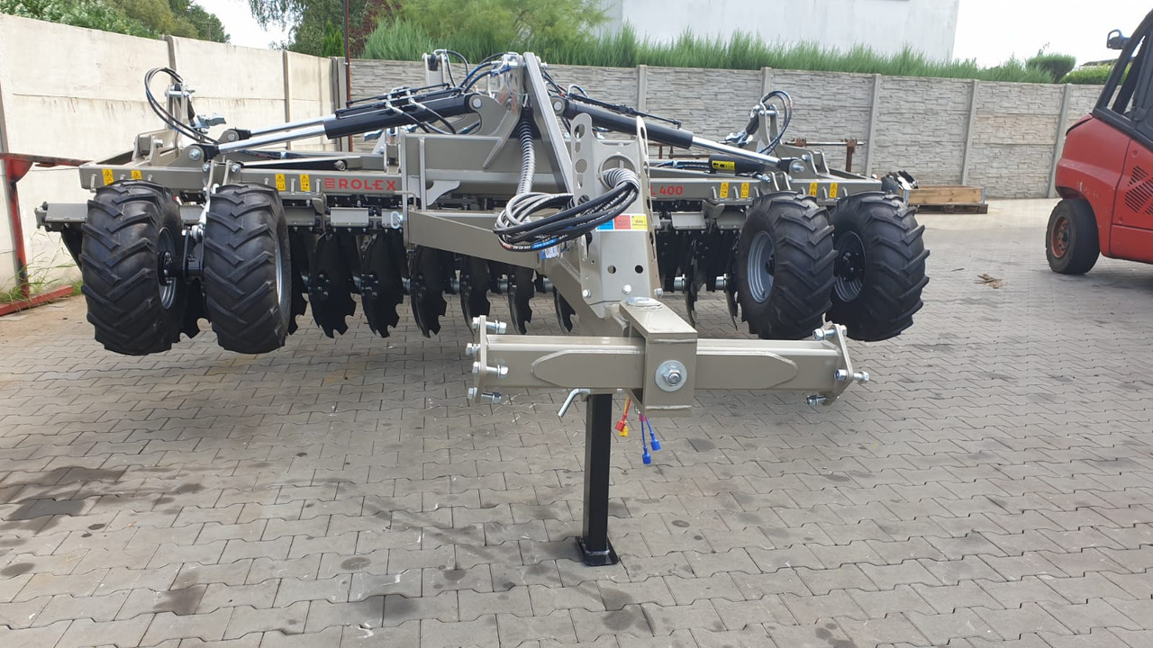 ROLEX Hydraulische Scheibenegge / Hydraulic discs harrow / Dechaumeur à disques / Erpice a dischi / Дисковая гидравлическая борона тип лёгкий с тележкой / Brona talerzowa hydraulicznie składana lekka 4 m - Disc harrow: picture 2 ROLEX Hydraulische Scheibenegge / Hydraulic discs harrow / Dechaumeur à disques / Erpice a dischi / Дисковая гидравлическая борона тип лёгкий с тележкой / Brona talerzowa hydraulicznie składana lekka 4 m - Disc harrow: picture 2
