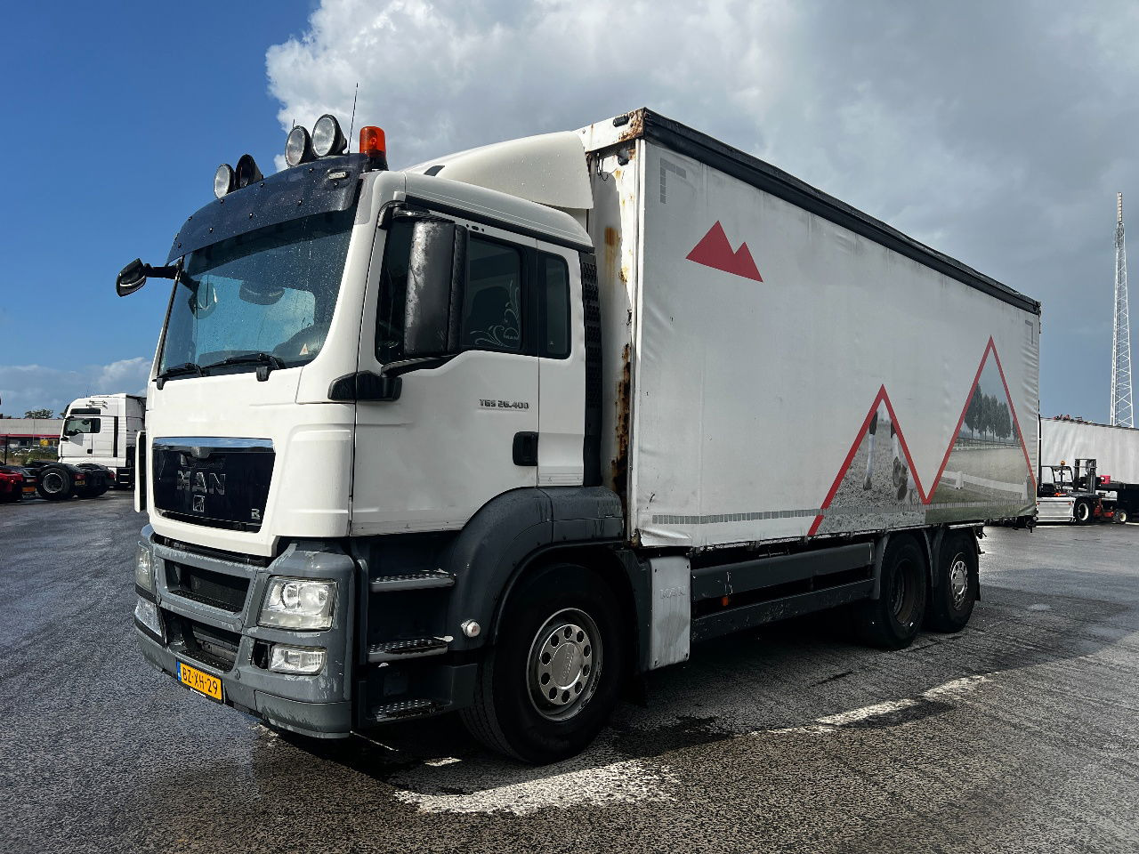MAN TGS 26.400 6x2, Euro 5 - Curtainsider truck: picture 1 MAN TGS 26.400 6x2, Euro 5 - Curtainsider truck: picture 1
