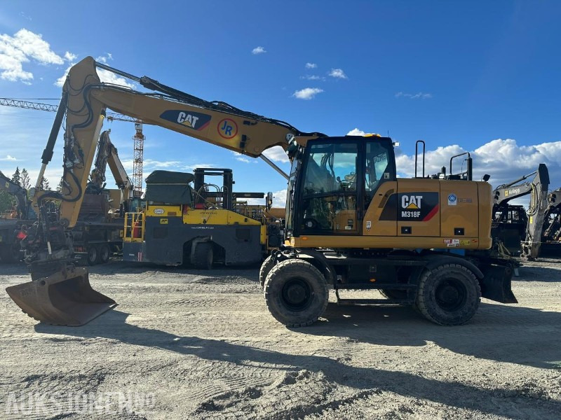 2019 Cat M318F hjulgraver med tiltrotator og skuff - Excavator: picture 1 2019 Cat M318F hjulgraver med tiltrotator og skuff - Excavator: picture 1