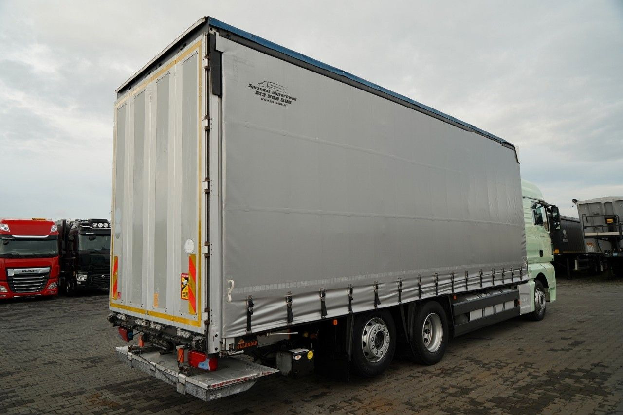 MAN TGX 26.440 / 6x2 / FIRANKA - 8,15 m / SOLÓWKA / MAN TGX 26.440 / 6x2 / FIRANKA - 8,15 m / SOLÓWKA / - Curtainsider truck: picture 4 MAN TGX 26.440 / 6x2 / FIRANKA - 8,15 m / SOLÓWKA / MAN TGX 26.440 / 6x2 / FIRANKA - 8,15 m / SOLÓWKA / - Curtainsider truck: picture 4