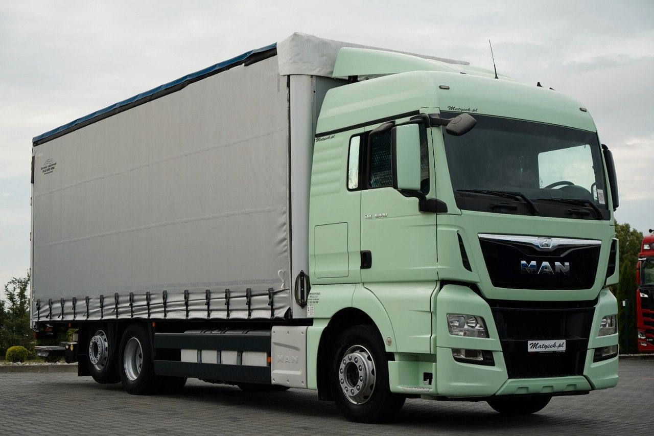 MAN TGX 26.440 / 6x2 / FIRANKA - 8,15 m / SOLÓWKA / MAN TGX 26.440 / 6x2 / FIRANKA - 8,15 m / SOLÓWKA / - Curtainsider truck: picture 1 MAN TGX 26.440 / 6x2 / FIRANKA - 8,15 m / SOLÓWKA / MAN TGX 26.440 / 6x2 / FIRANKA - 8,15 m / SOLÓWKA / - Curtainsider truck: picture 1