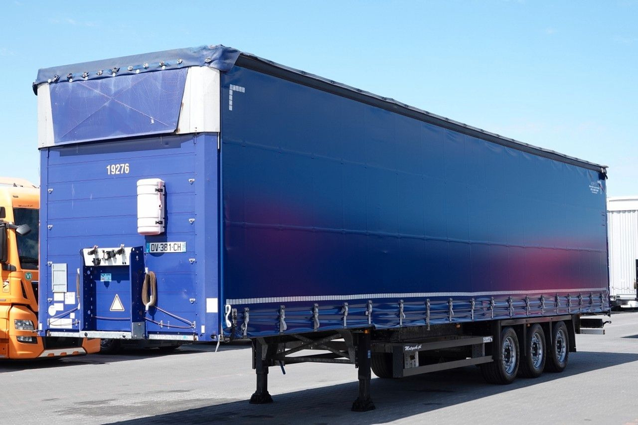 Schmitz Cargobull FIRANKA VARIOS / PODNOSZONY DACH / OPONY 385/55 - Curtainsider semi-trailer: picture 1 Schmitz Cargobull FIRANKA VARIOS / PODNOSZONY DACH / OPONY 385/55 - Curtainsider semi-trailer: picture 1